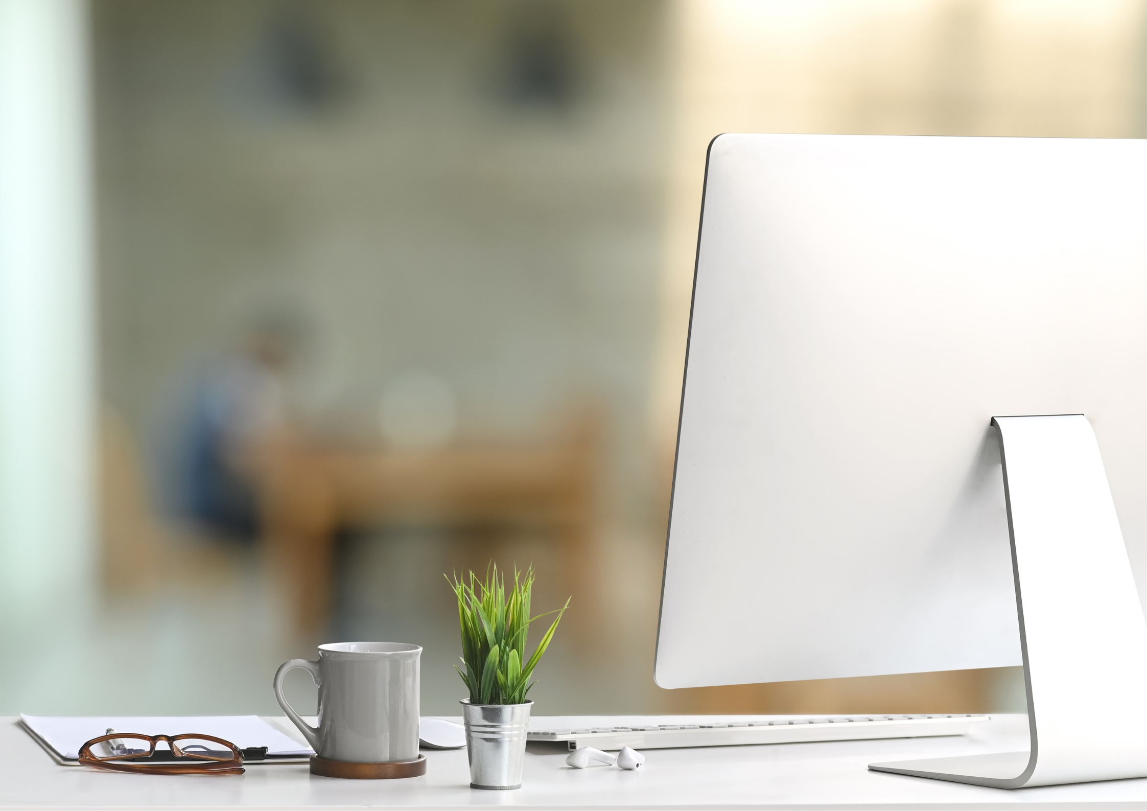 Minimalist workspace with a sleek computer monitor for a clean, modern look.