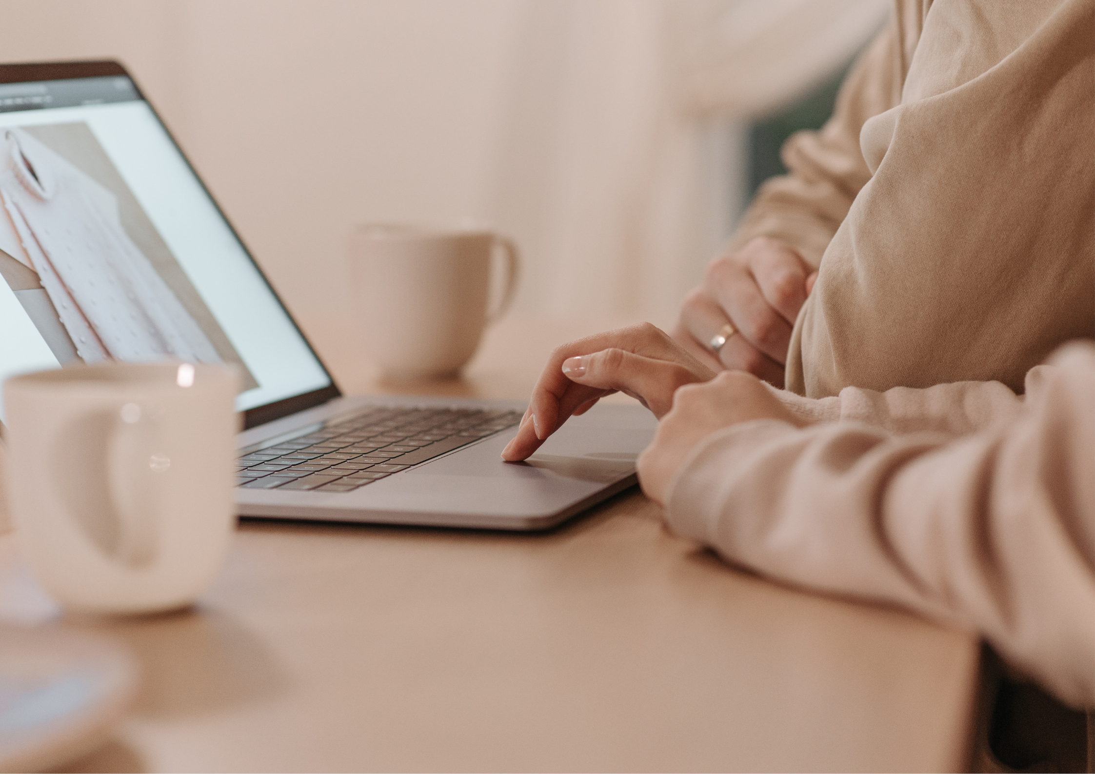 beige themed laptop with a girl on it